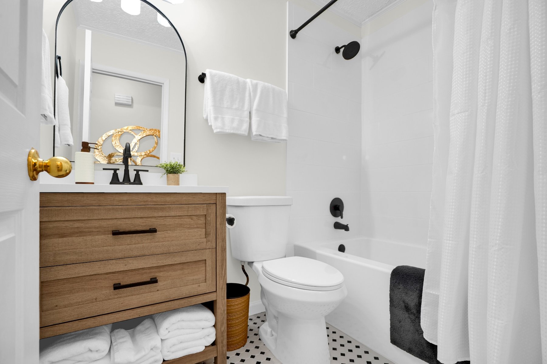 Updated bathroom with shower tub combination
